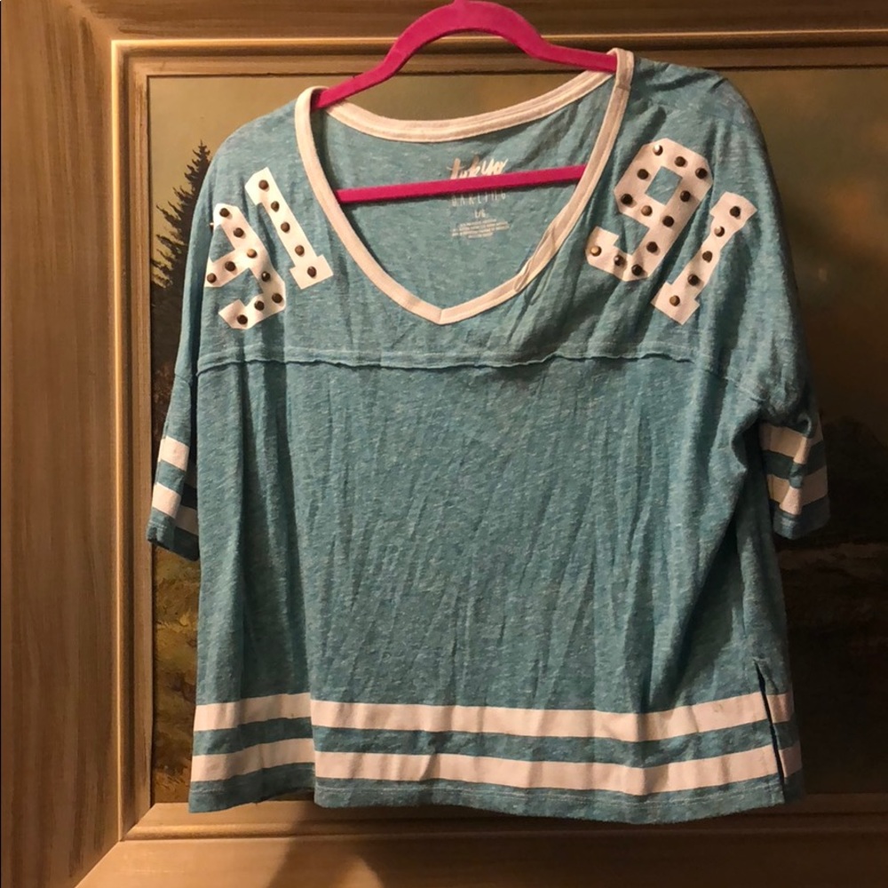Large crop top. Still in good condition
